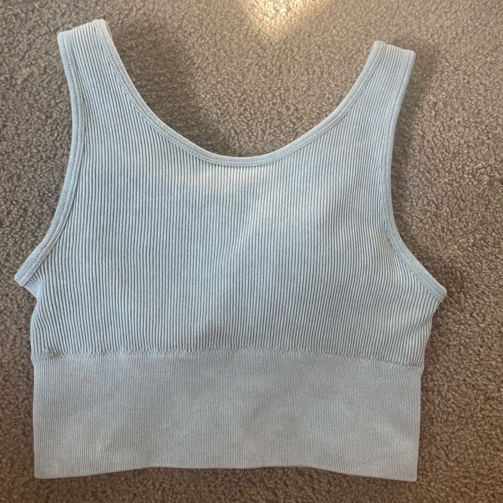 Women’s ribbed size small athletic tank comes with padding